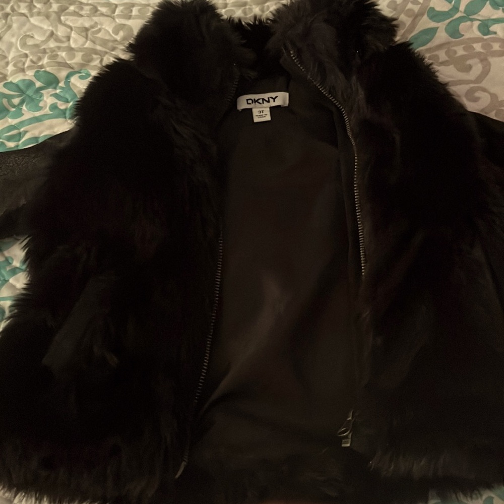 Like new DKNY faux fur jacket/vest.purchased from macys, worn 2x’s.
